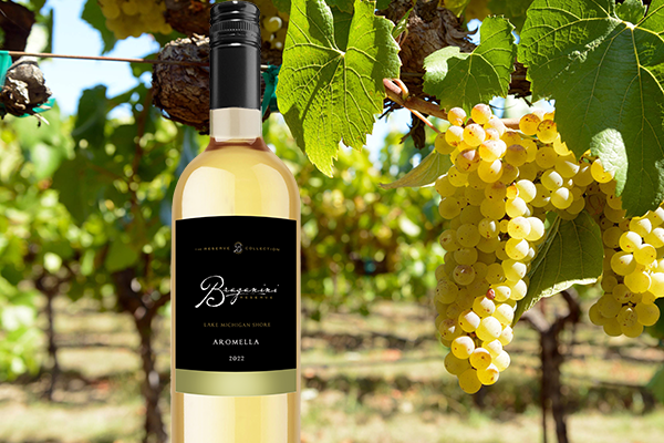 Image of Braganini Reserve Aromella  wine and Aromella grapes on in vineyard. 