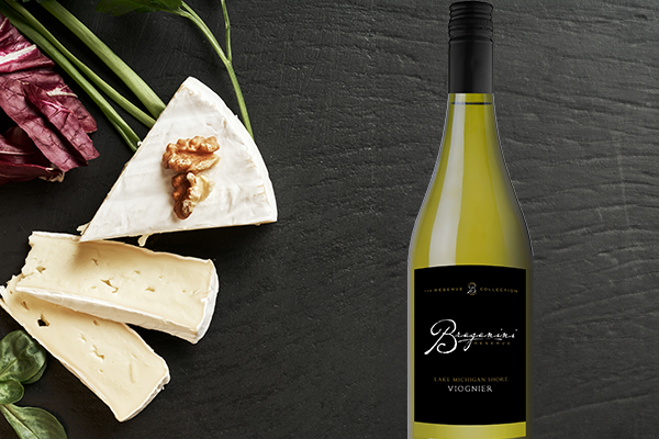 Image of Braganini Reserve Viognier wine and brie cheese. 