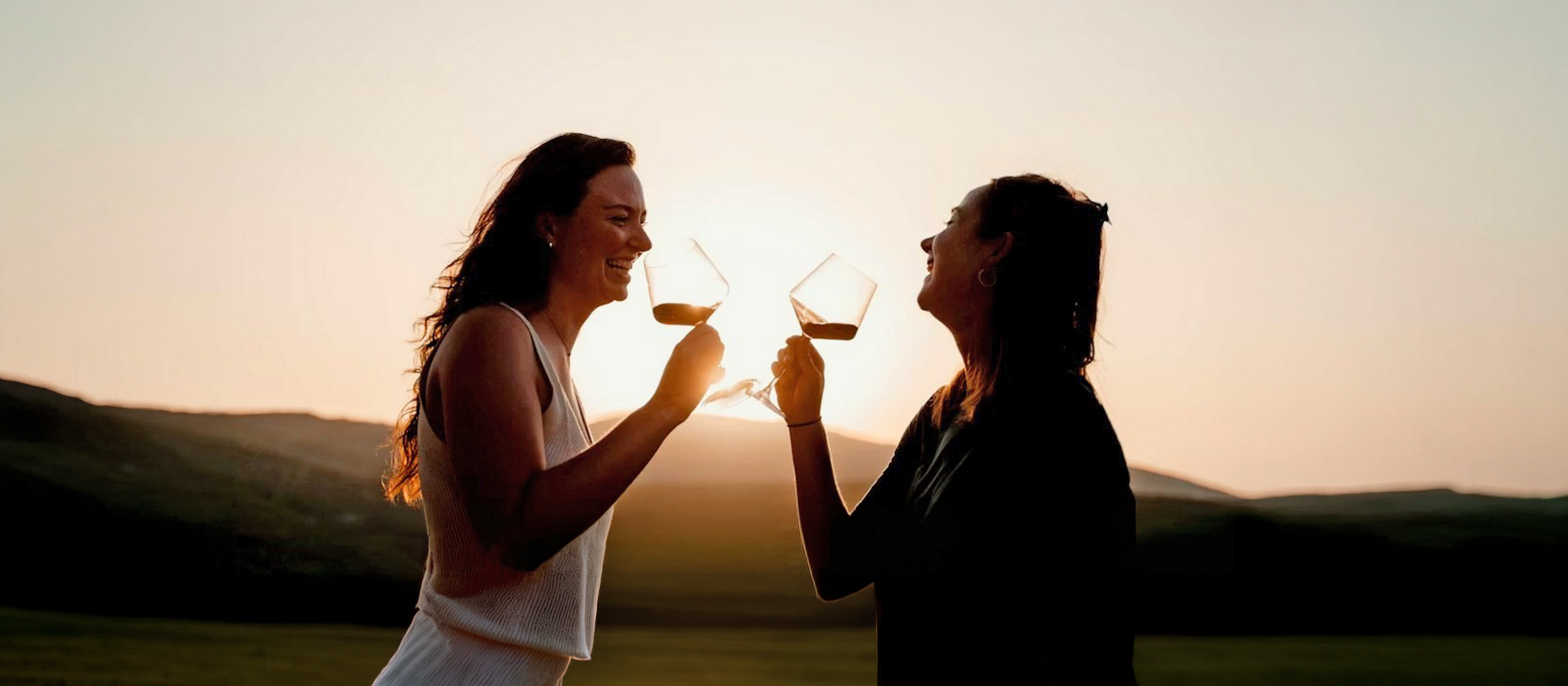 women drinking wine